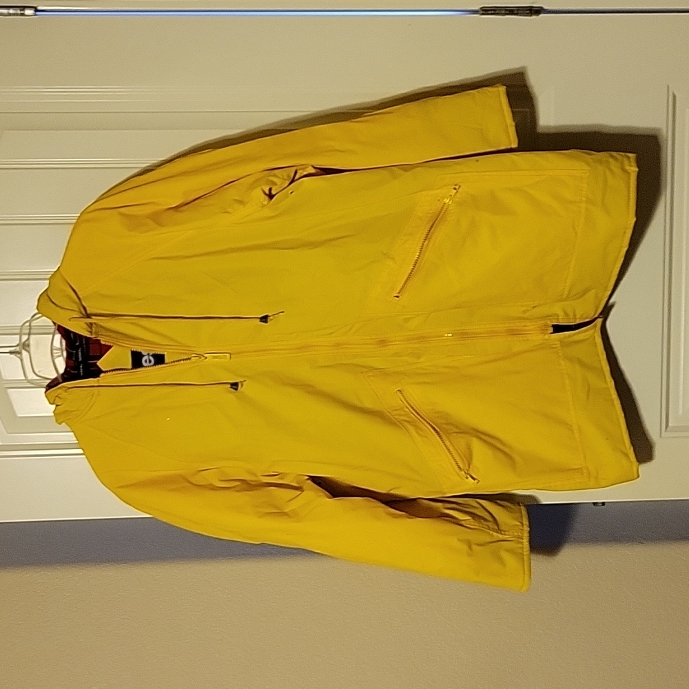 Fleece-lined yellow rain coat. totes brand. Size small. Fits larger though